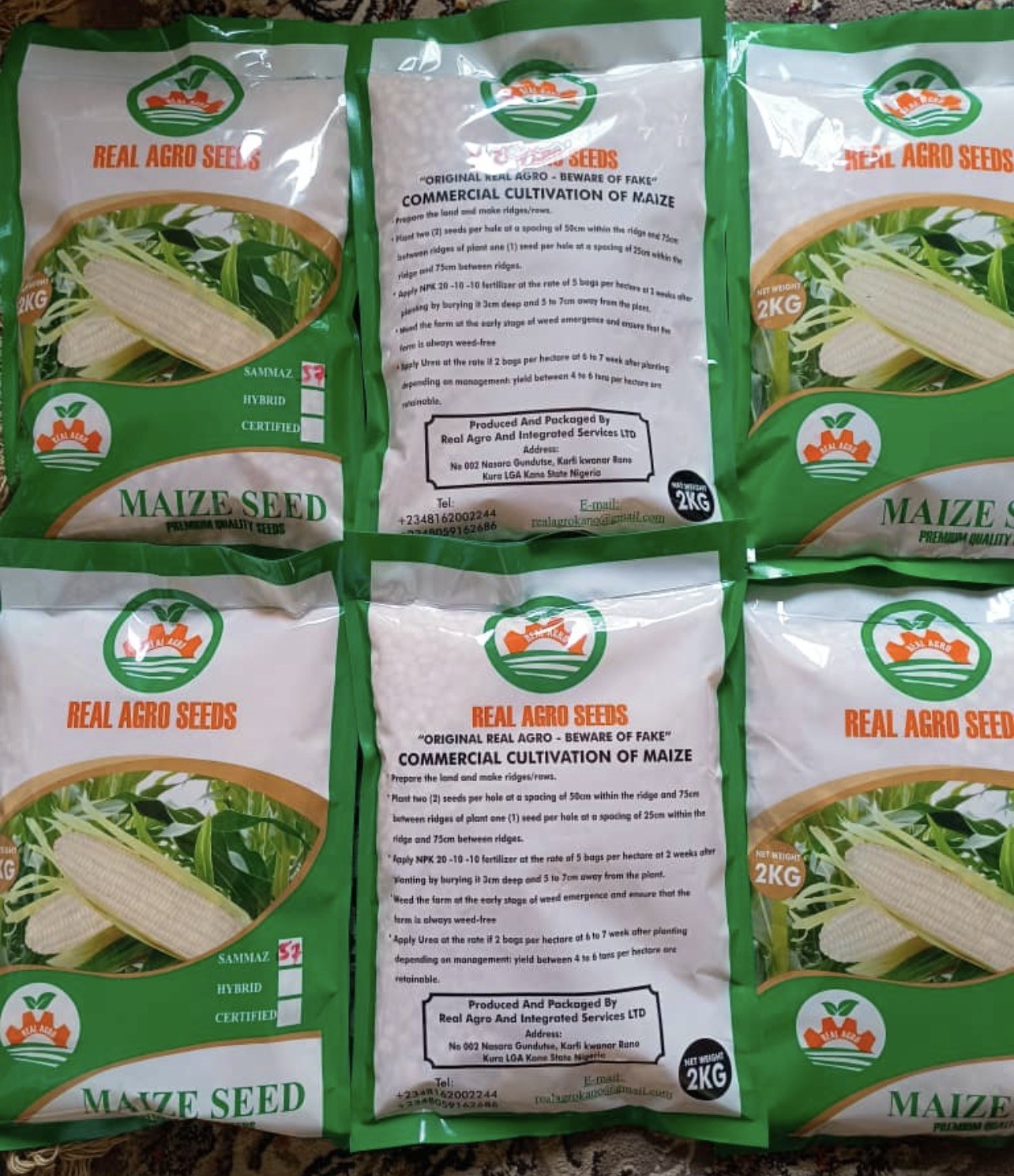 Real Agro certified hybrid maize seed packets